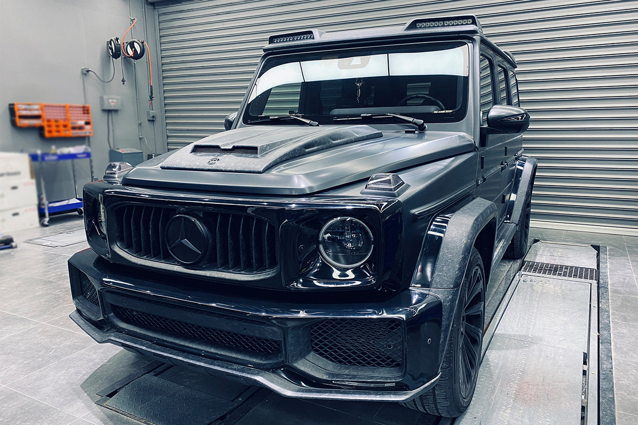 thumbnail image 2 of Front Roof Spoiler Fits For Mercedes Benz G Class W463 G500 G550 G55 G63 G65 AMG Wagon 2013-2018 Custom Parts Carbon Fiber Window Wing Lip Spoiler Body Kits Factory Outlet (with Led 2 of 14